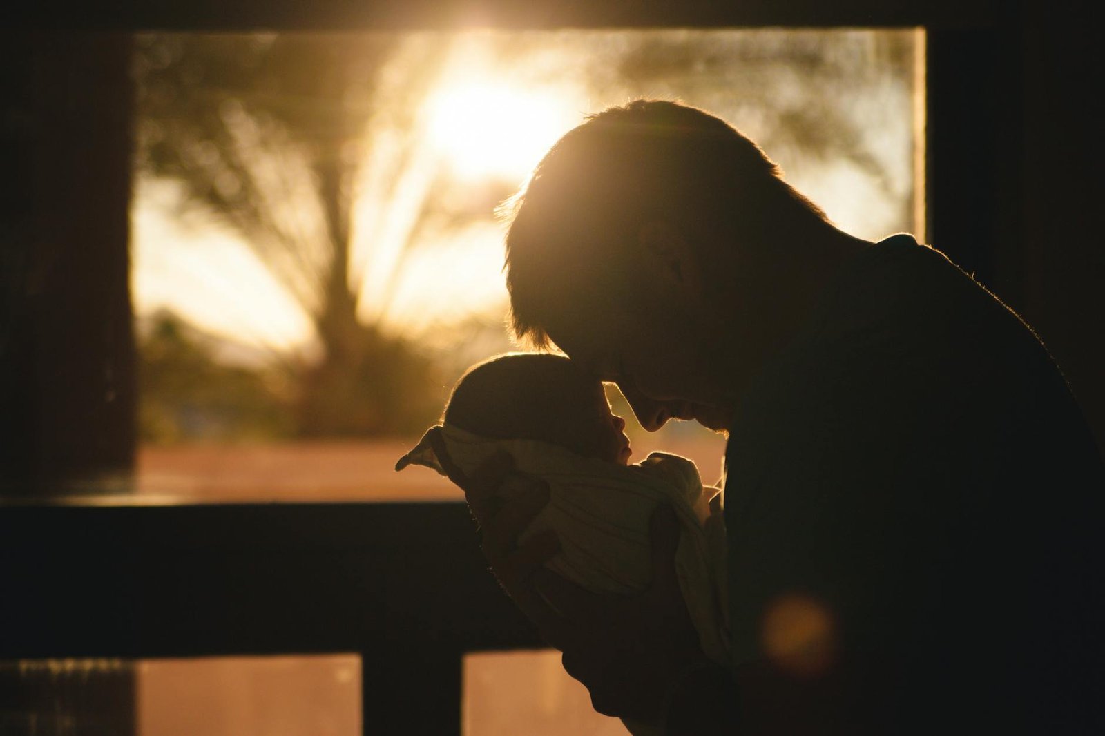 man loving his baby